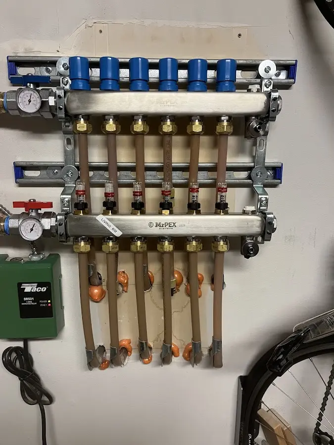 Plumber performing Water Heater Repair at a residential property in Deer Park